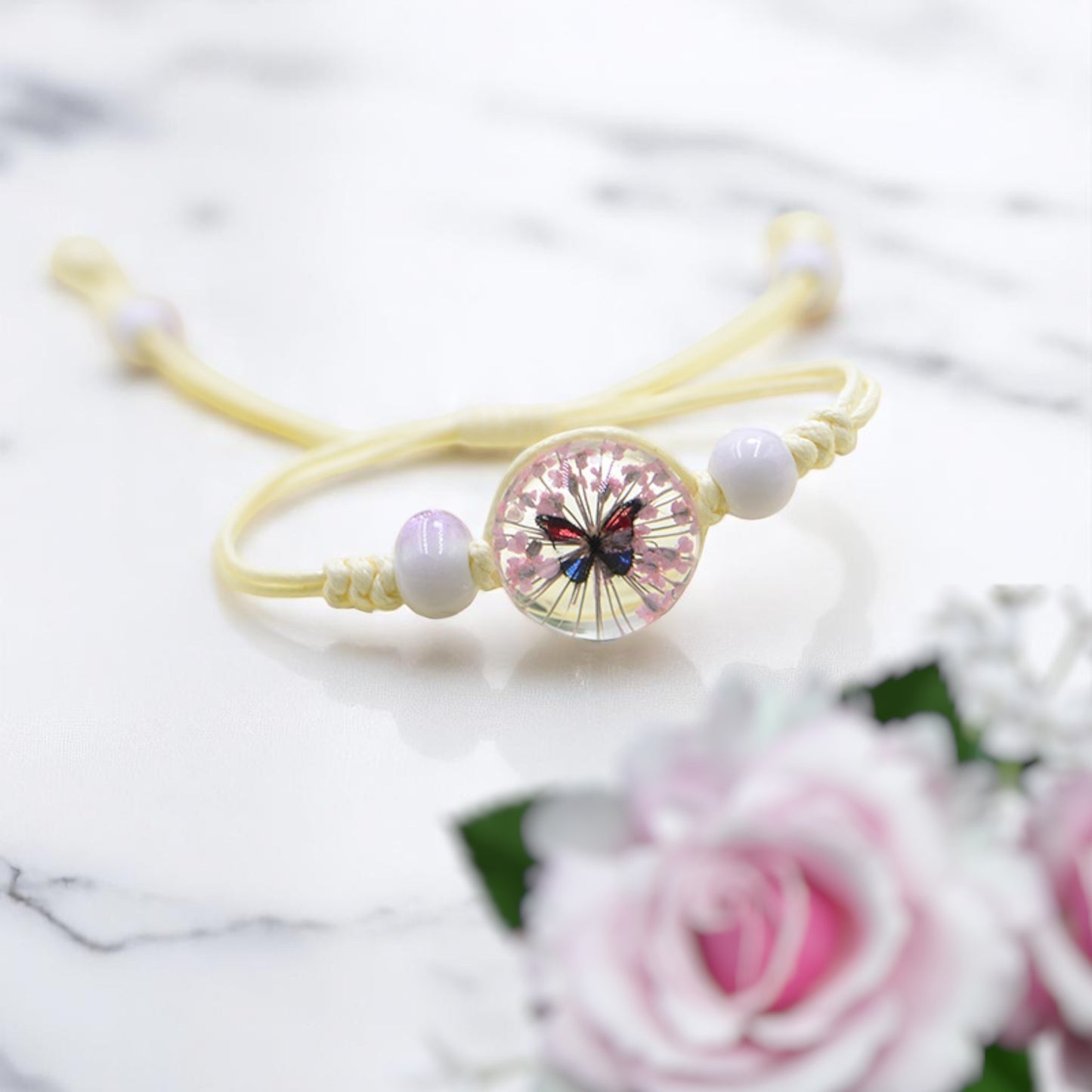 Handmade Butterfly Charm Bracelet with Floral Resin Center, Floral butterfly jewelry, Nature-inspired jewelry, Whimsical bracelet design, Delicate handmade jewelry