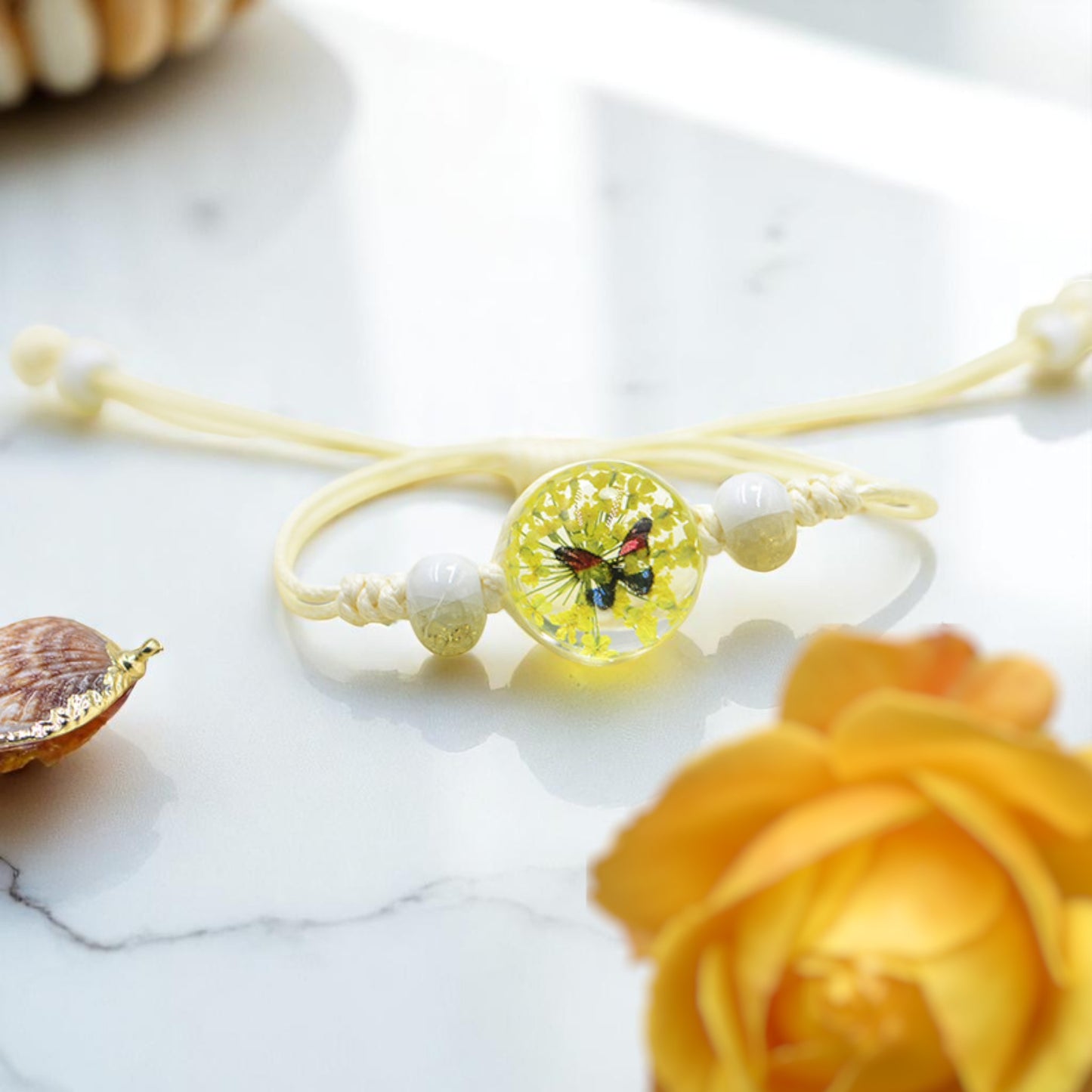 Handmade Butterfly Charm Bracelet with Floral Resin Center, Floral butterfly jewelry, Nature-inspired jewelry, Whimsical bracelet design, Delicate handmade jewelry