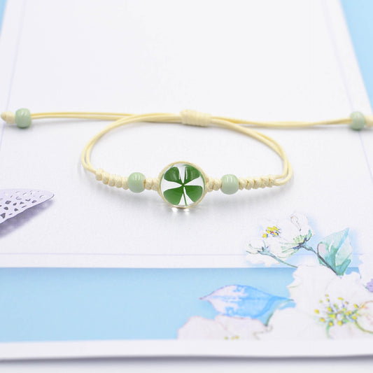 Handcrafted Four-Leaf Clover Bracelet - Adjustable Cord Design, Good luck charm, Handcrafted jewelry, Nature-inspired accessory, Lucky charm bracelet